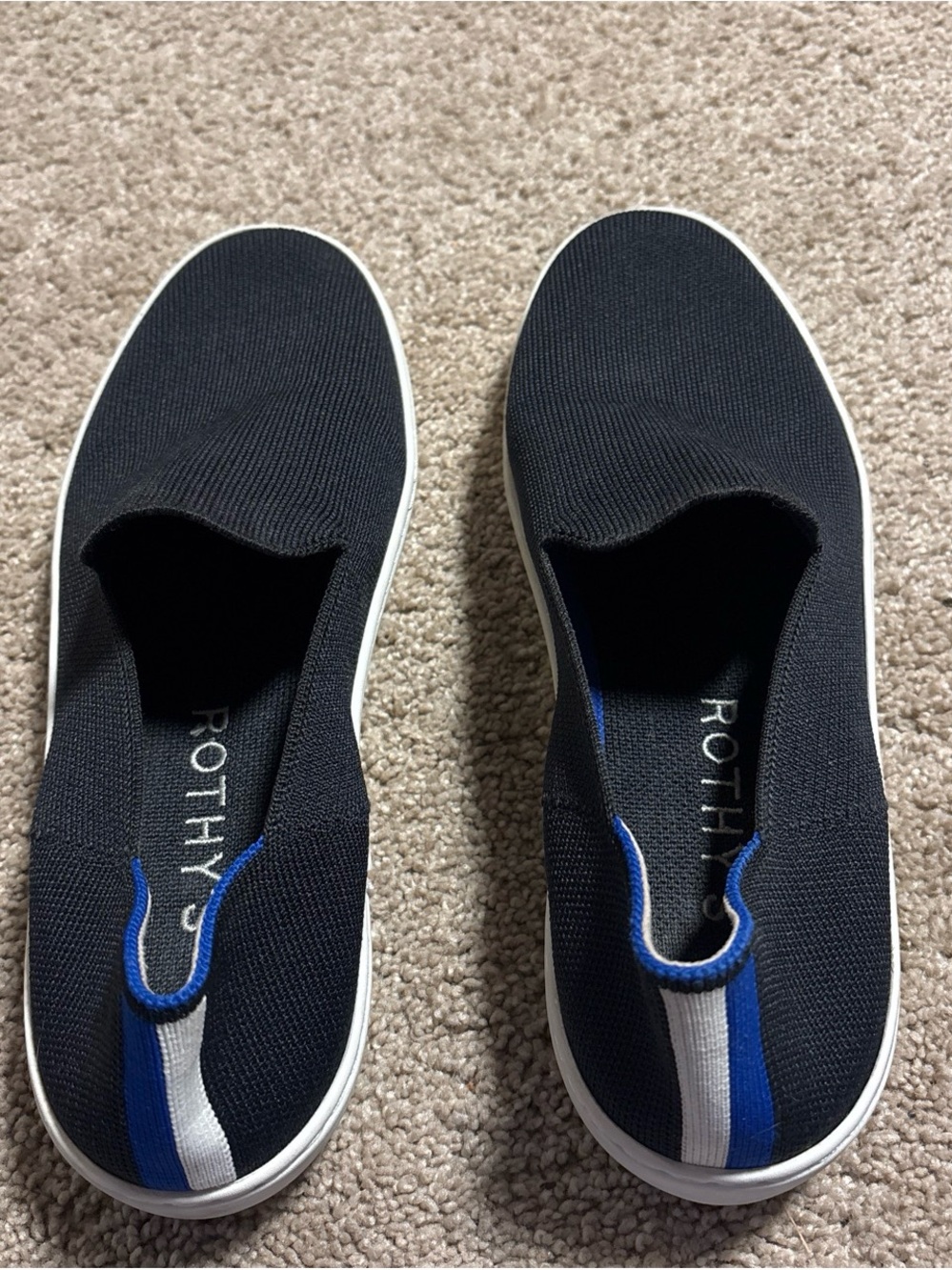 Rothy's Black Knit Slip-On Sneakers with Blue and White Pull Tab